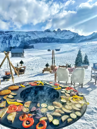 Vegetables on an outdoor plancha, facing the Courchevel mountains