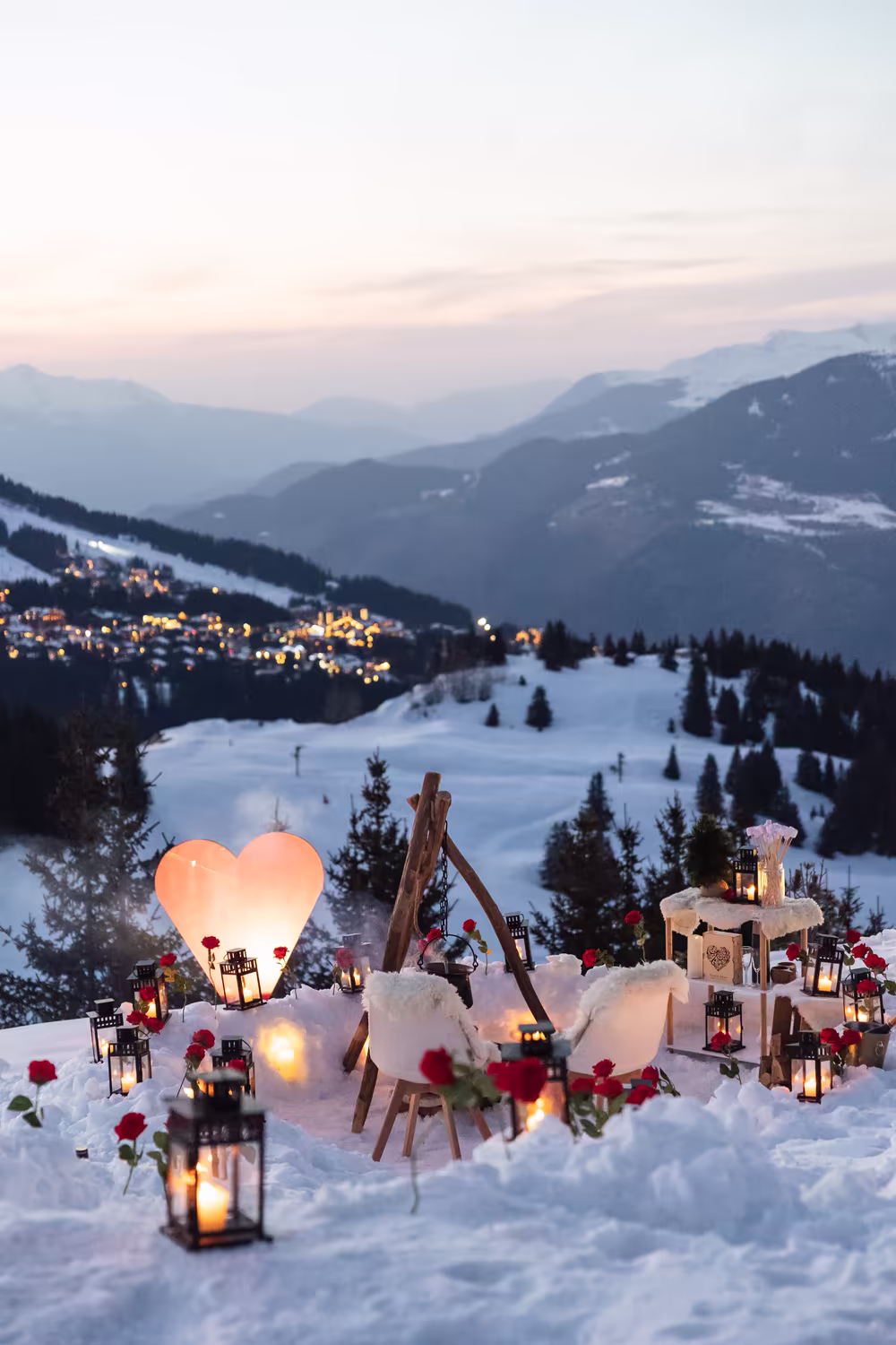 A glowing heart beside the fire and sheepskin chairs, the valley lights coming on at dusk